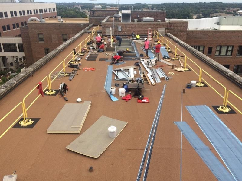 Modified bitumen built up roof installation replacement hospital