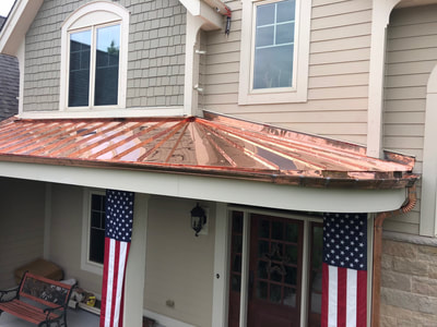 Custom metal roof and gutter